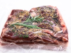 spiced pork belly prepared for sous vide low temperature cooking