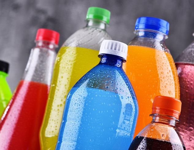 Plastic bottles of assorted carbonated soft drinks