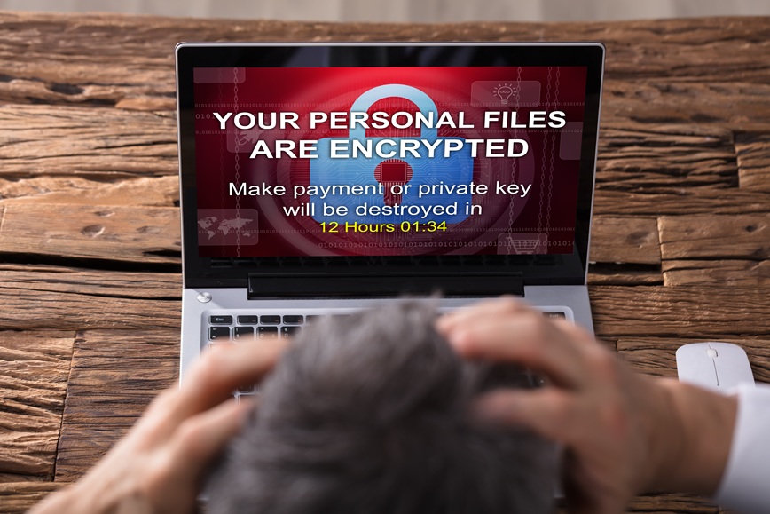 Looking At Laptop Screen Showing Personal Files Encrypted Text